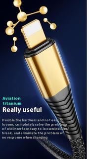 Close-up of a durable aviation titanium charging cable with a gold head showcasing its strength and usability.