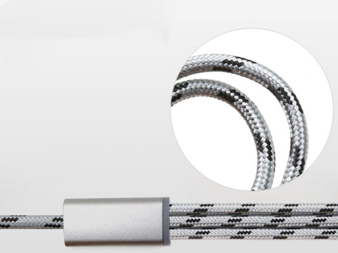 Close-up of a braided charging cable in silver and black, showcasing its durable design and connectors.
