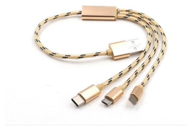 Three-in-one USB charging cable with Type-C, Micro USB, and Lightning connectors in gold color.